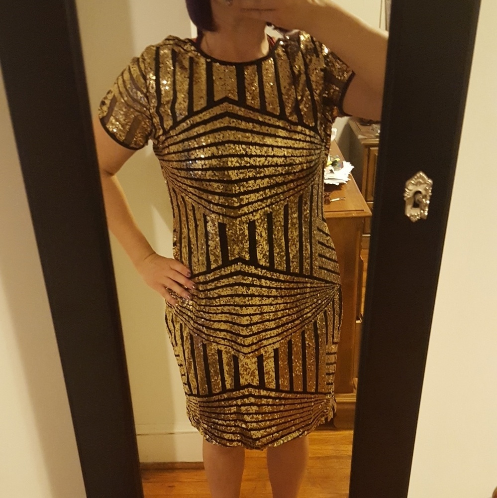 Gold and black knee length dress